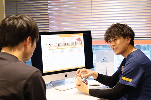 患者と話すドクター